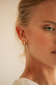 Gold Toned Pearl Gem Huggie Lira Earrings