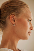 Silver Toned Pearl Huggie Lira Earrings